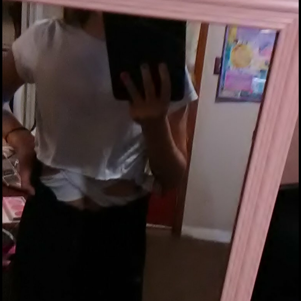 Homemade c op top with a x in the front